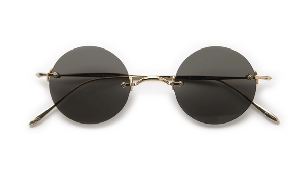 lentes-de-sol-misterios-color-oro